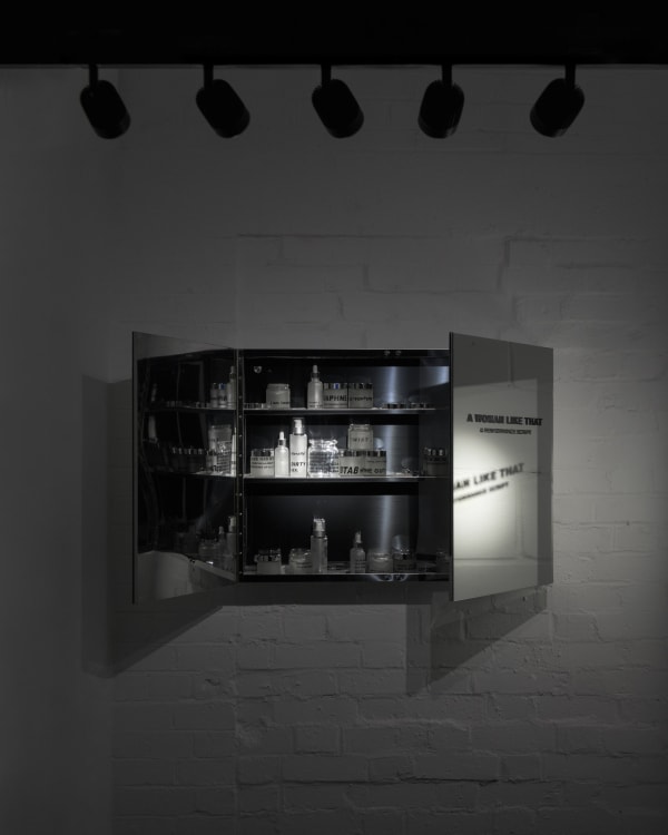 A Woman Like That, 2025 Glass, stainless steel, cosmetic containers, vinyl 60 x 80 x 10 cm