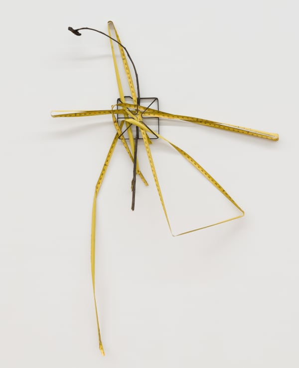 HOUSE BREAK, 2019 - 2022 Measuring tape, dried sunflower, and stove top 30 x 30 in 76.2 x 76.2 cm