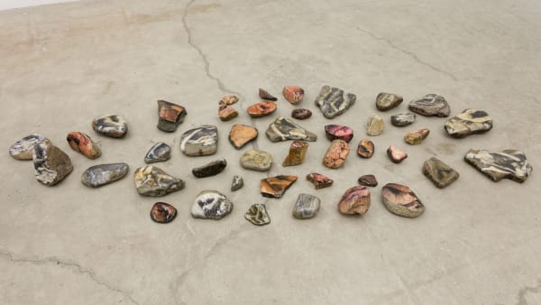 Aura Rosenberg Dialectical Porn Rocks, 1989-2016 rocks, newspaper, xerox, resin Dimensions variable