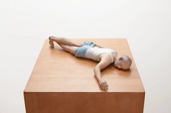 ERIC WESLEY New Realistic Figures (Sleeping): Michel, 2009/2015 Paint and plastic on stained maple pedestal Figure: 3 1/2 x 8 3/4 x 18 in (8.9 x 22.2 x 45.7cm) Pedestal: 56 x 11 1/2 x 11 1/2 in (142.2 x 29.2 x 29.2cm)