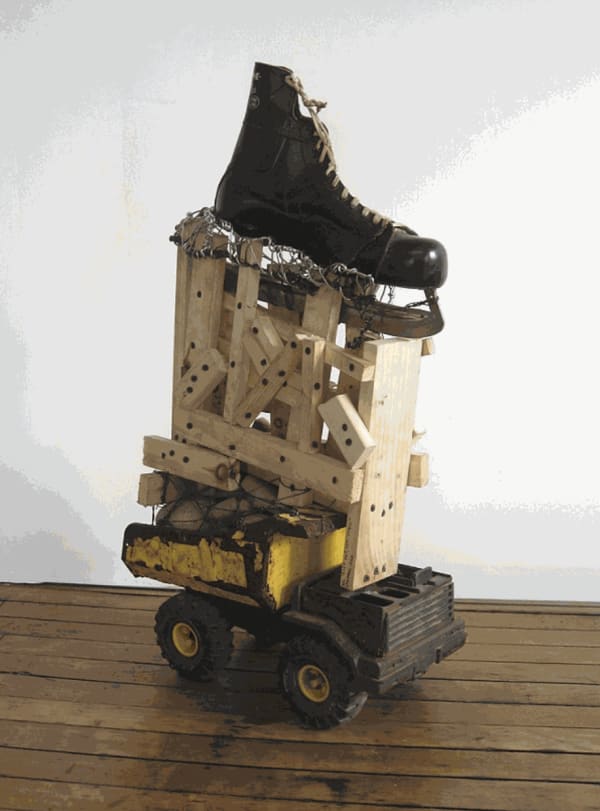 Arthur Simms Left Foot, One Halo, 2010 Ice skate, wire, stones, metal, wood, toy truck, and screws 33 x 17 x 8 in 83.8 x 43.2 x 20.3 cm