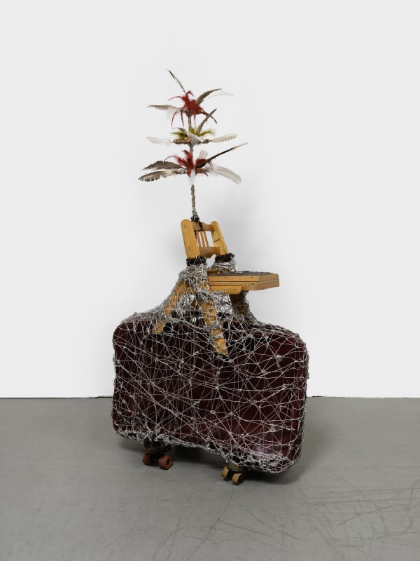 Arthur Simms Icema’s Chair, 2017 Wire, feathers, earth, wood, suitcase, chair, skateboards, and bamboo 62 1/2 x 35 x 16 in 158.8 x 88.9 x 40.6 cm