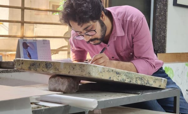 Chirag Kumawat Works On A Lithograph