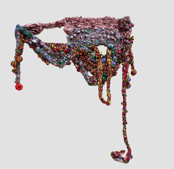 Samuel Nnorom, OKE NDI ICHIE, Mixed media, African wax print fabric, 203.5 x 183 x 12.5 cm - Image courtesy of Saatchi Gallery and Tiwani Contemporary
