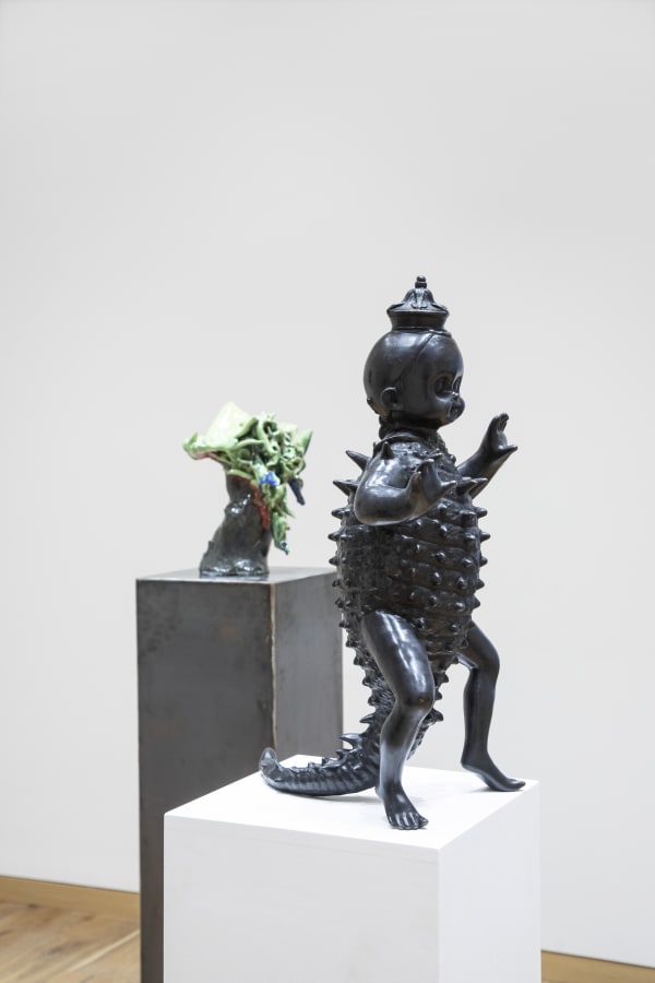 Left: Ruben Pang, Nerves for Infinite Returns, 2018-2019, Ceramic, 41 × 26 × 35 cm Right: Ronald Ventura, Zookeeper, 2018, Bronze, 68 × 37 × 37 cm, 1/3