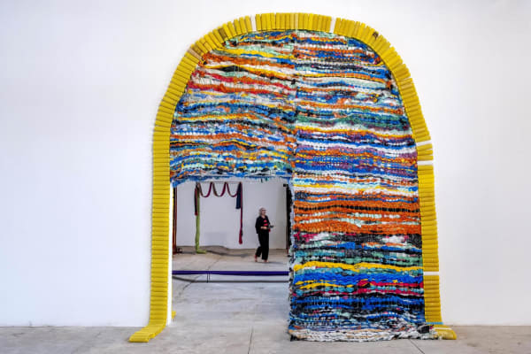 GOLDEN DOORS A & B Weaving found plastic objects (bags, spools of string, toothbrushes, etc.) 485 x 360 x 13 cm Collaboration: Aymen Gharbi and during phase I: Aymen Koundi, Aziz Hamlia, Aziz Rakm, Lotfi Hrizi and during phase II: Adem el Ayeb, Ghada Loussaïf, Thouraya Loussaïf