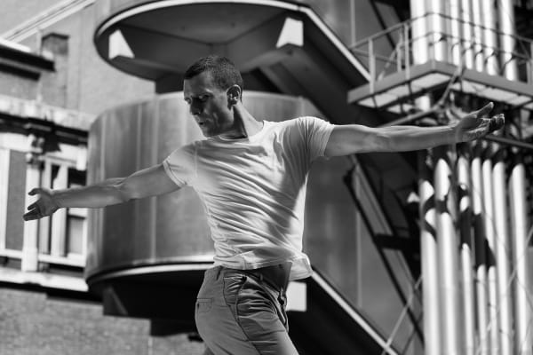 Movement study - Dancing 4. Dancer Jonathan Goddard. At the Lloyds building, London, UK. Prints of dancers. By movement photographer Simon Tomkinson.