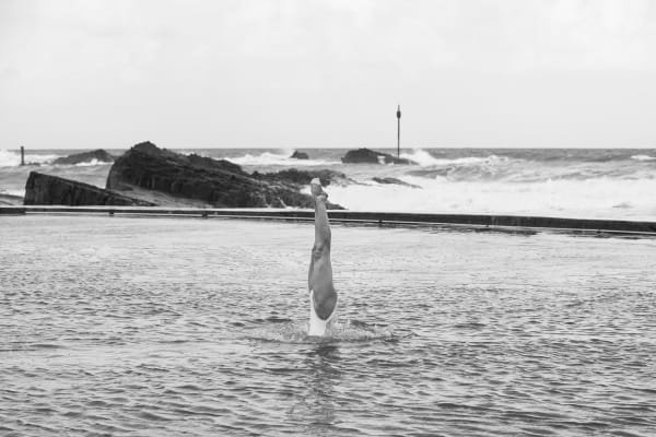 Movement study - Swimming 2. Synchronised swimmer Genevieve Randall. At Bude sea pool, Cornwall, UK. Prints of athletes. By movement photographer Simon Tomkinson.