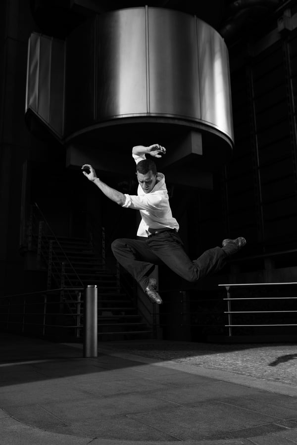 Movement study - Dancing 2. Dancer Jonathan Goddard. At the Lloyds building, London, UK. Prints of dancers. By movement photographer Simon Tomkinson.