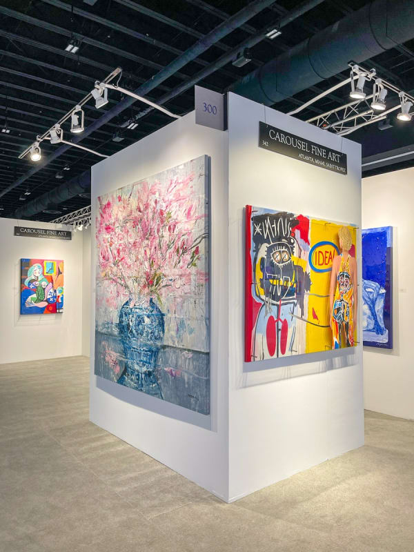 Carousel Fine Art's booth at an art fair.