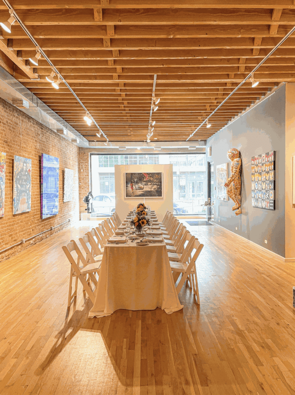 Table decorated for Collector's Dinner at Carousel Fine Art's gallery space in Chicago.
