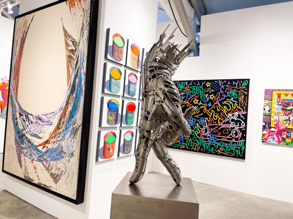 Paintings and sculptures displayed at Carousel Fine Art's booth at the art fair, Context Art Miami 2021.