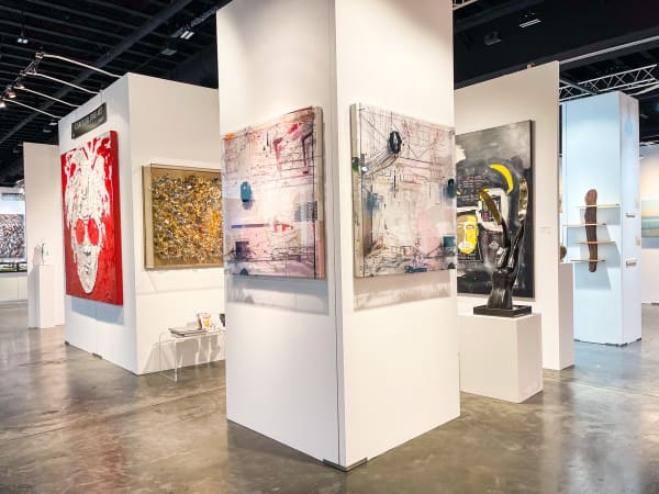 Paintings displayed at Carousel Fine Art's booth at the Palm Beach Show art fair, 2022.