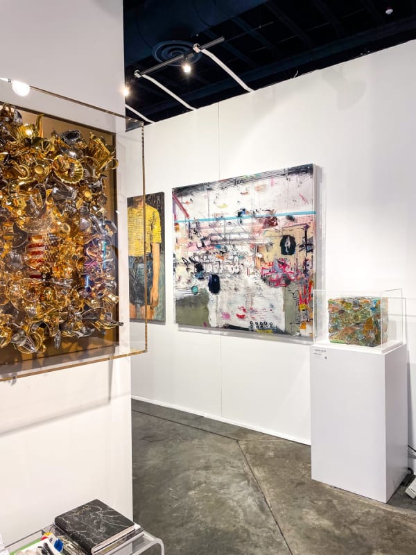Paintings displayed at Carousel Fine Art's booth at the Palm Beach Show art fair, 2022.