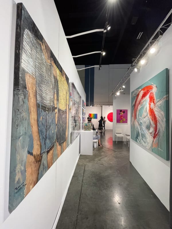 Paintings displayed at Carousel Fine Art's booth at the Palm Beach Show art fair, 2022.