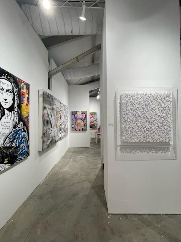 Paintings displayed at Carousel Fine Art's booth at the art fair, Context Art Miami 2022