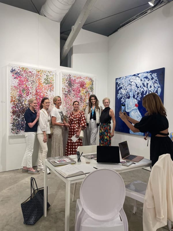 People at Carousel Fine Art's booth at the art fair, Context Art Miami 2022.