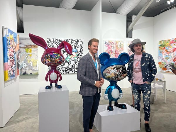 People at Carousel Fine Art's booth at the art fair, Context Art Miami 2022