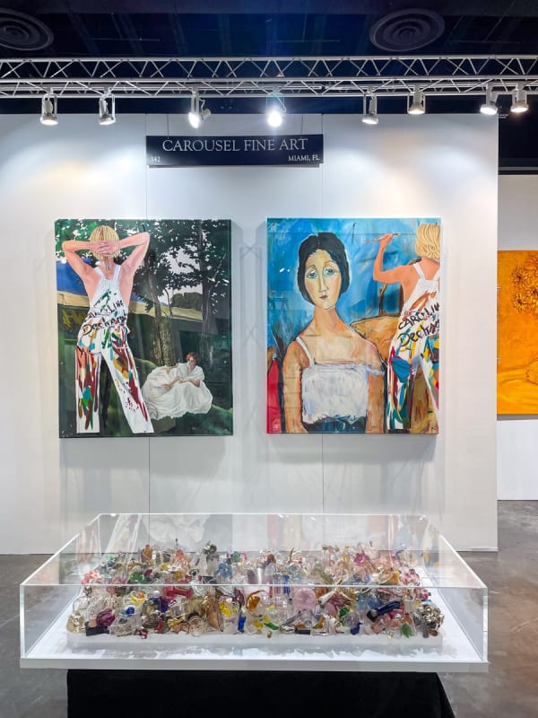 Paintings displayed at Carousel Fine Art's booth at the Palm Beach Show art fair, 2023.