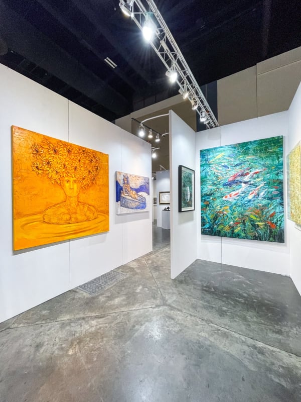 Paintings displayed at Carousel Fine Art's booth at the Palm Beach Show art fair, 2023.