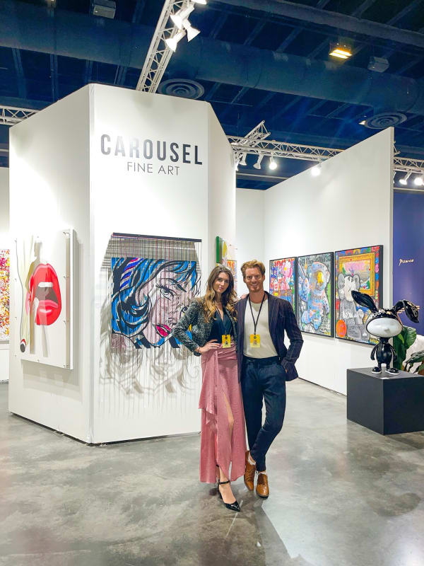 People at Carousel Fine Art's booth at Art Palm Beach, art fair 2023.