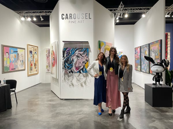 People at Carousel Fine Art's booth at Art Palm Beach, art fair 2023.