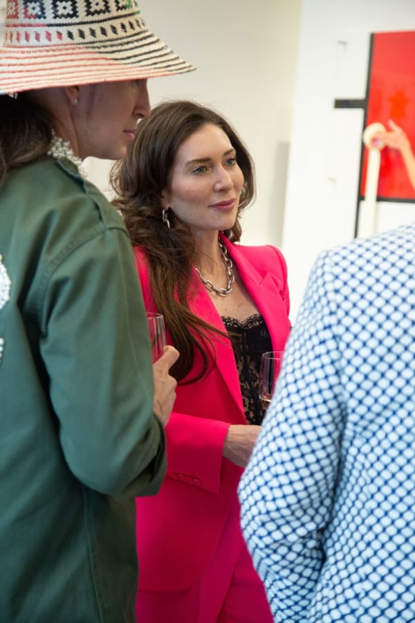 People at Carousel Fine Art's gallery space in Buckhead Village, Atlanta during the Caroline Dechamby Retrospective.