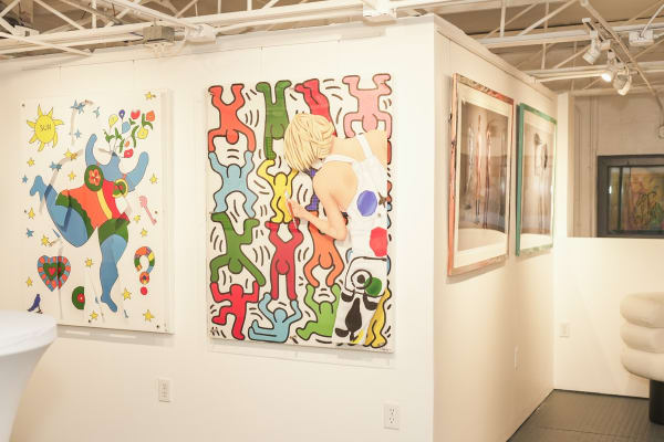 Paintings displayed on wall at Carousel Fine Art's Miami gallery space for the Grand Opening.