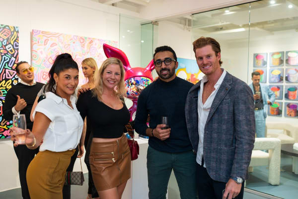 People at Carousel Fine Art's Miami gallery space during the Grand Opening.