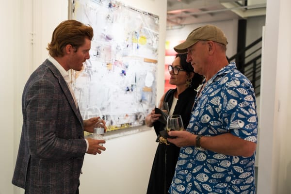 People in Carousel Fine Art's Miami gallery space during the Grand Opening.