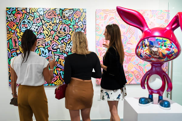 People in Carousel Fine Art's Miami gallery space during the Grand Opening.