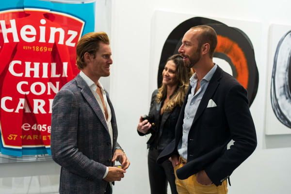 People in Carousel Fine Art's Miami gallery space during the Grand Opening.
