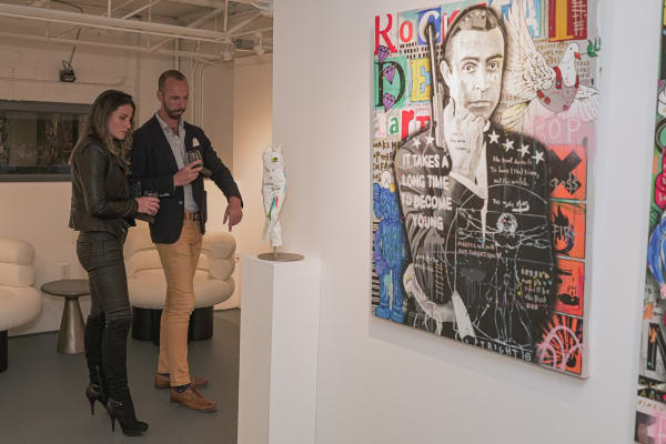 People in Carousel Fine Art's Miami gallery space during the Grand Opening.