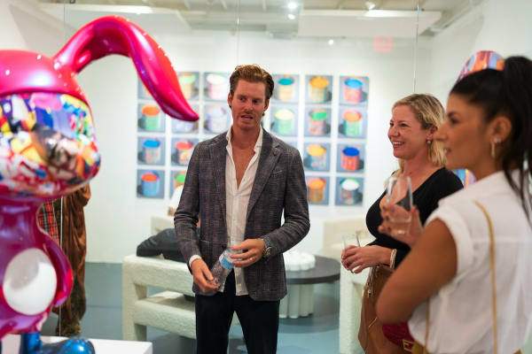 People in Carousel Fine Art's Miami gallery space during the Grand Opening.