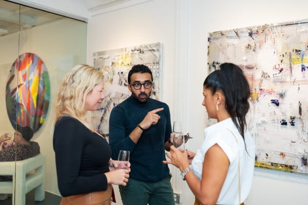 People in Carousel Fine Art's Miami gallery space during the Grand Opening.
