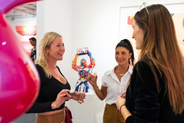 People in Carousel Fine Art's Miami gallery space during the Grand Opening.