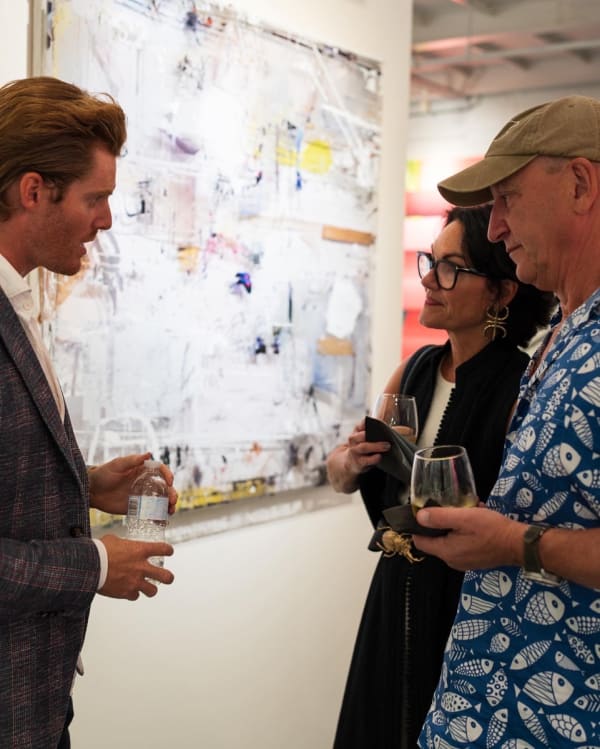 People in Carousel Fine Art's Miami gallery space during the Grand Opening.