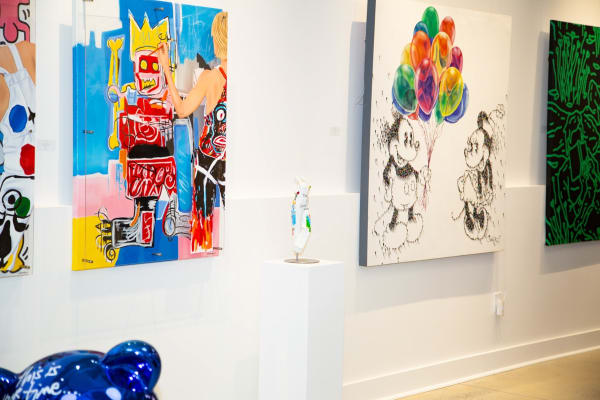 Paintings displayed at Carousel Fine Art's new gallery space in Buckhead Village, Atlanta during an event for their grand opening.