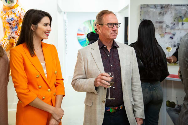 People at Carousel Fine Art's new gallery space in Buckhead Village, Atlanta during an event for their grand opening.