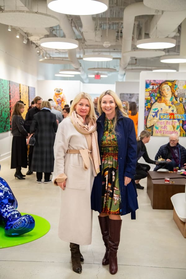 People at Carousel Fine Art's new gallery space in Buckhead Village, Atlanta during an event for their grand opening.