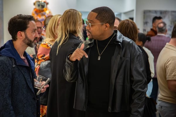 People at Carousel Fine Art's new gallery space in Buckhead Village, Atlanta during an event for their grand opening.