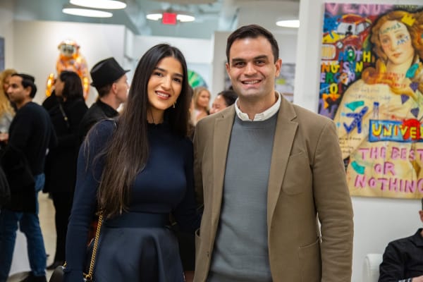 People at Carousel Fine Art's new gallery space in Buckhead Village, Atlanta during an event for their grand opening.