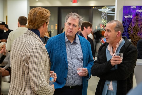 People at Carousel Fine Art's new gallery space in Buckhead Village, Atlanta during an event for their grand opening.