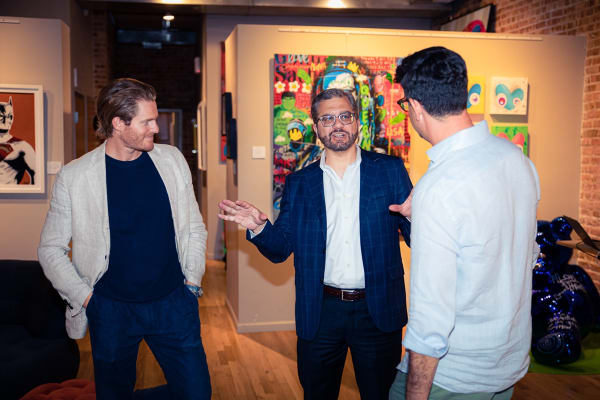 People in Carousel Fine Art's Chicago gallery space.