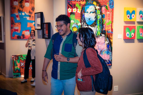 People in Carousel Fine Art's Chicago gallery space.