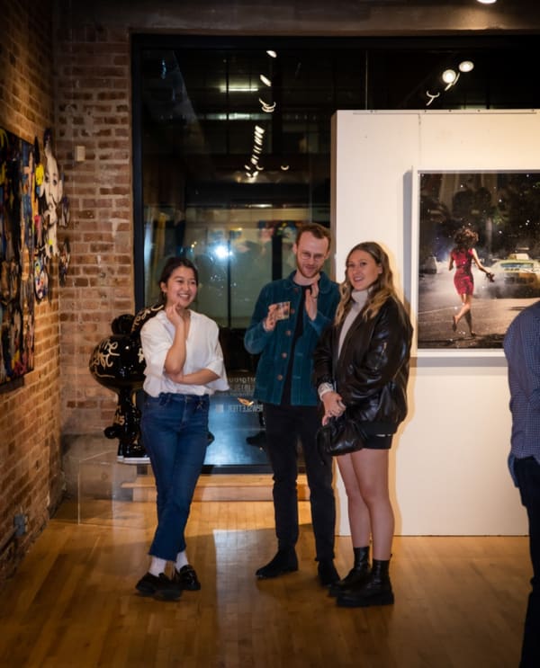People in Carousel Fine Art's Chicago gallery space.