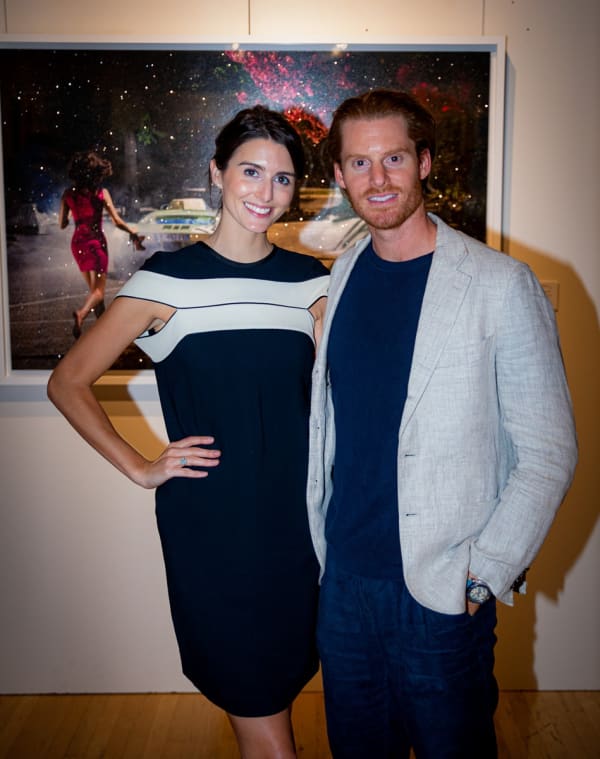 People posing in Carousel Fine Art's Chicago gallery space.