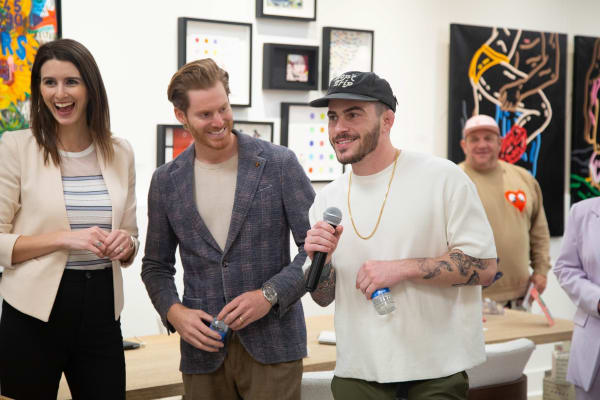 Gallery owners and artist John Westbay in Carousel Fine Art's Atlanta gallery space during the spotlight exhibition for John Westbay titled "Love, Outside the Lines."