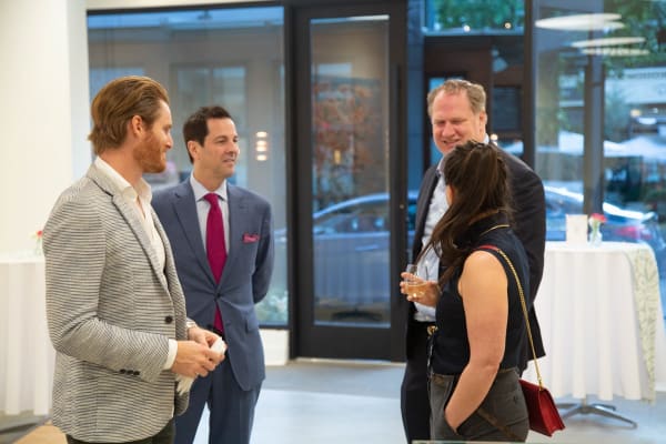 People in Carousel Fine Art's Buckhead Village location during the Eric Alfaro exhibition "Spring Reverie."