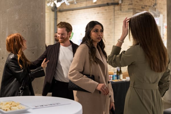People at a Chicago art event, a solo exhibition for artist Chance Cooper titled "Action!", hosted by Chicago art gallery Carousel Fine Art.